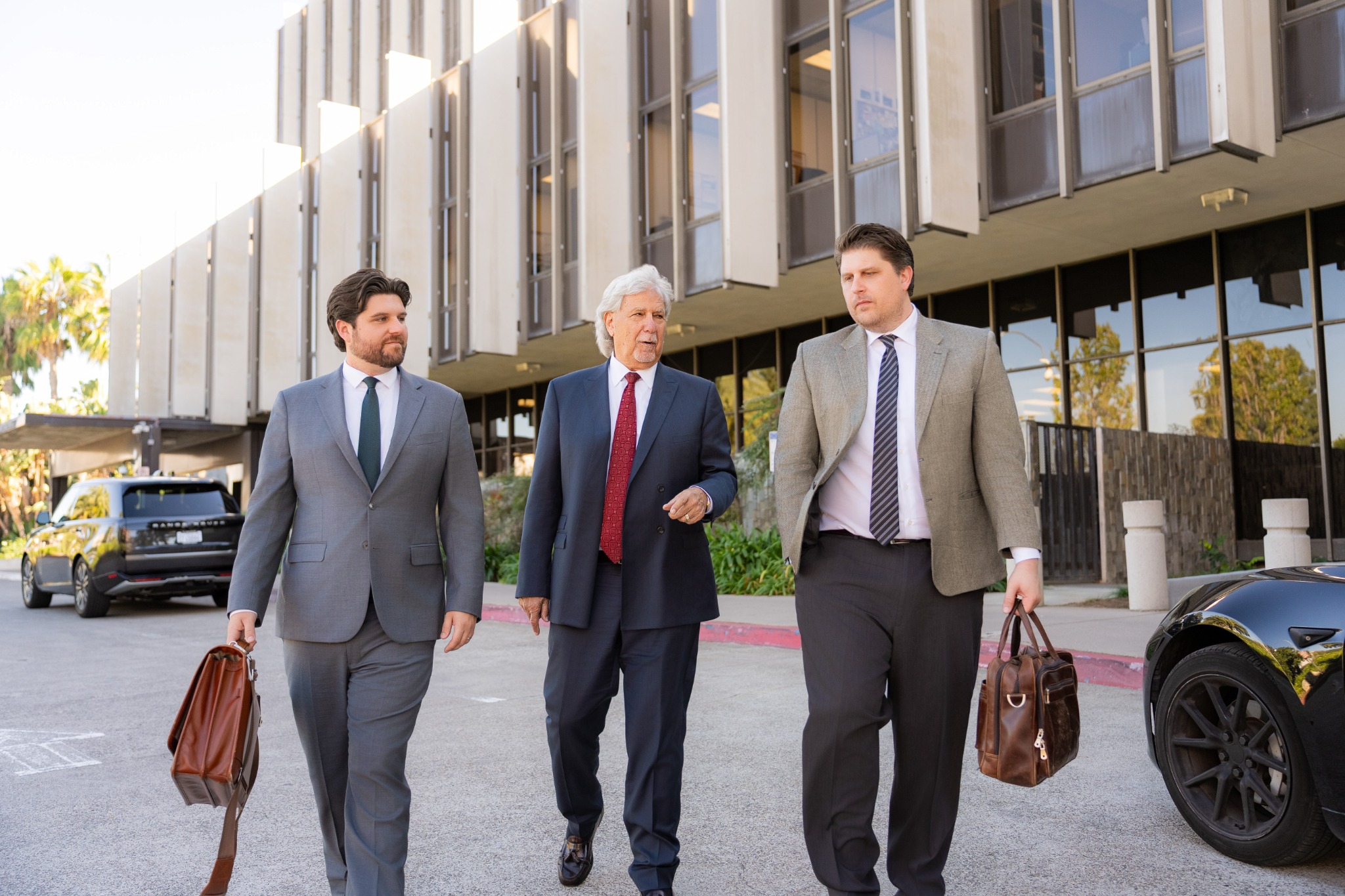 Attorneys of Shapiro Law Firm PC walking near the courthouse